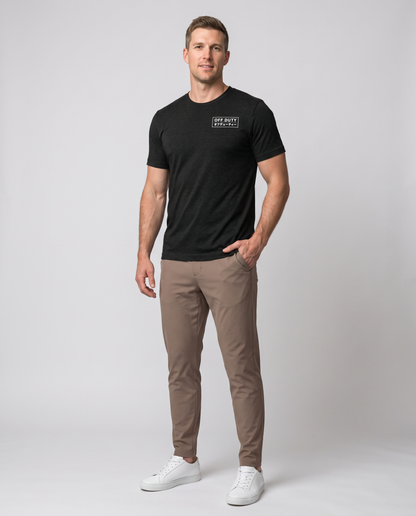 Off Duty Men's Triblend Tee in Black on a studio model, full-body three-quarter view