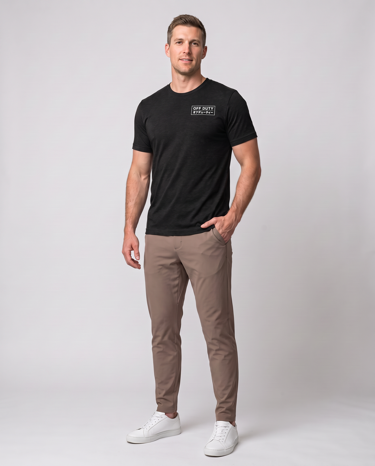Off Duty Men's Triblend Tee in Black on a studio model, three-quarter full-body view