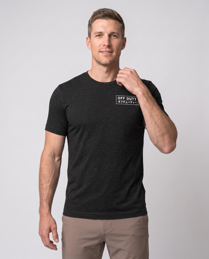 Off Duty Men's Triblend Tee in Black on a studio model, collar detail
