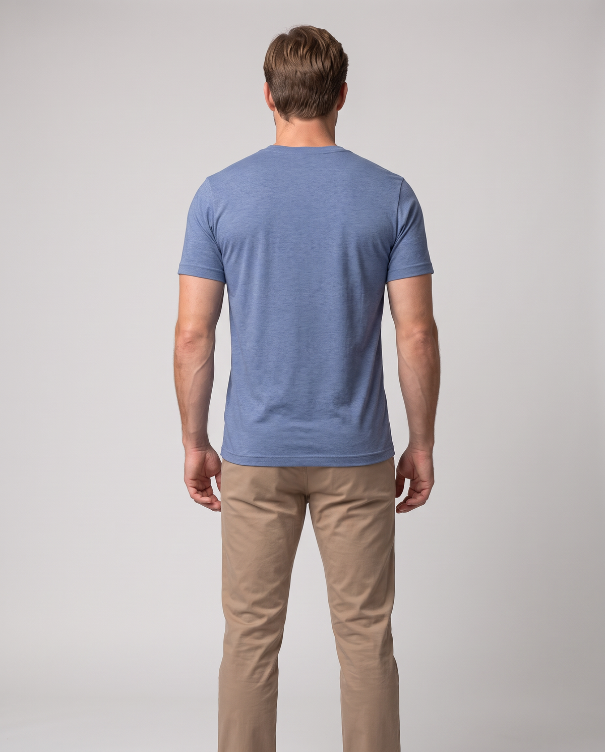 Off Duty Men's Triblend Tee in Blue on a studio model, back-facing view
