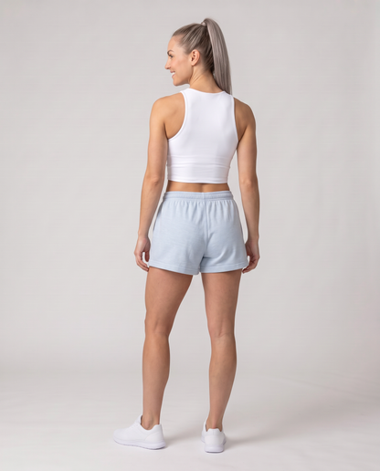 Off Duty Sunday Shorts in Light Washed Denim on model, scene 6 — od-color:light-washed-denim