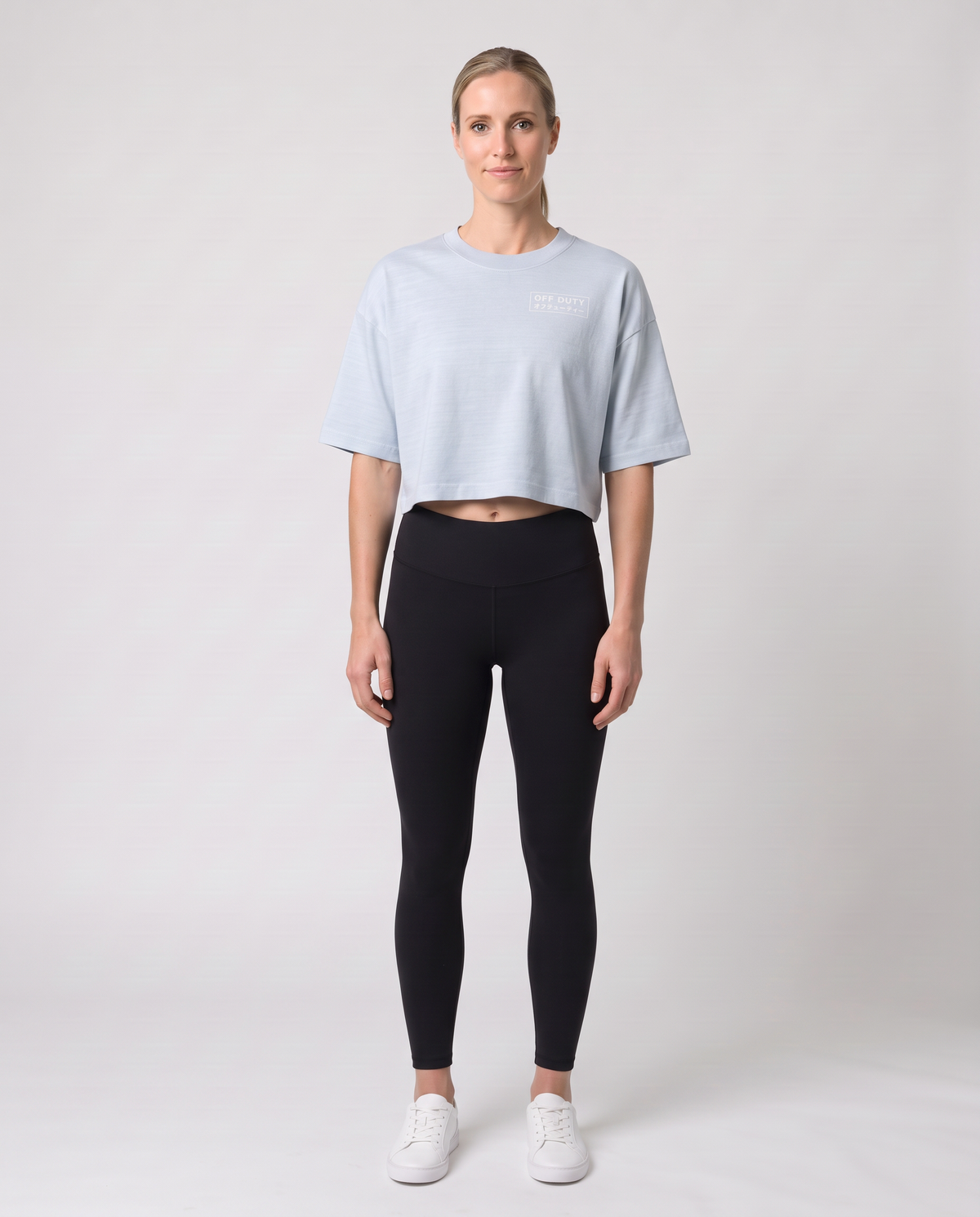 Off Duty The Weekend Cropped Tee in Light Washed Denim on model, scene 2 — od-color:light-washed-denim