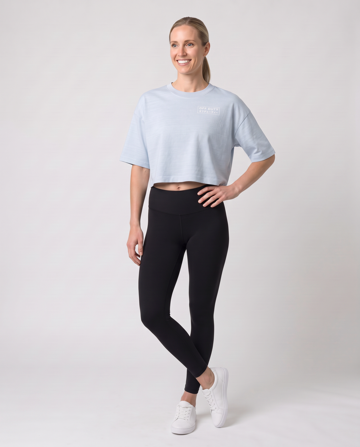 Off Duty The Weekend Cropped Tee in Light Washed Denim on model, scene 3 — od-color:light-washed-denim