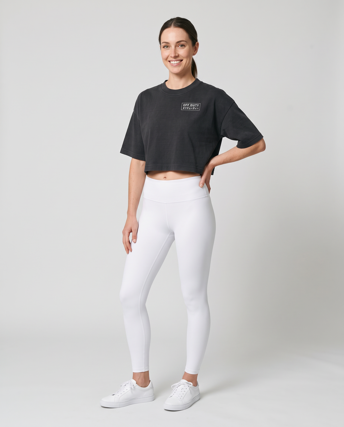 Off Duty The Weekend Cropped Tee in Washed Black on model, scene 1 — od-color:washed-black