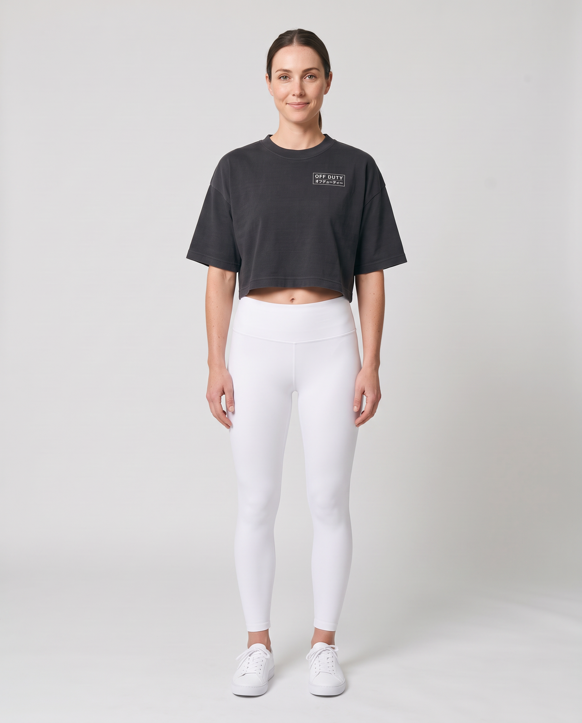 Off Duty The Weekend Cropped Tee in Washed Black on model, scene 2 — od-color:washed-black