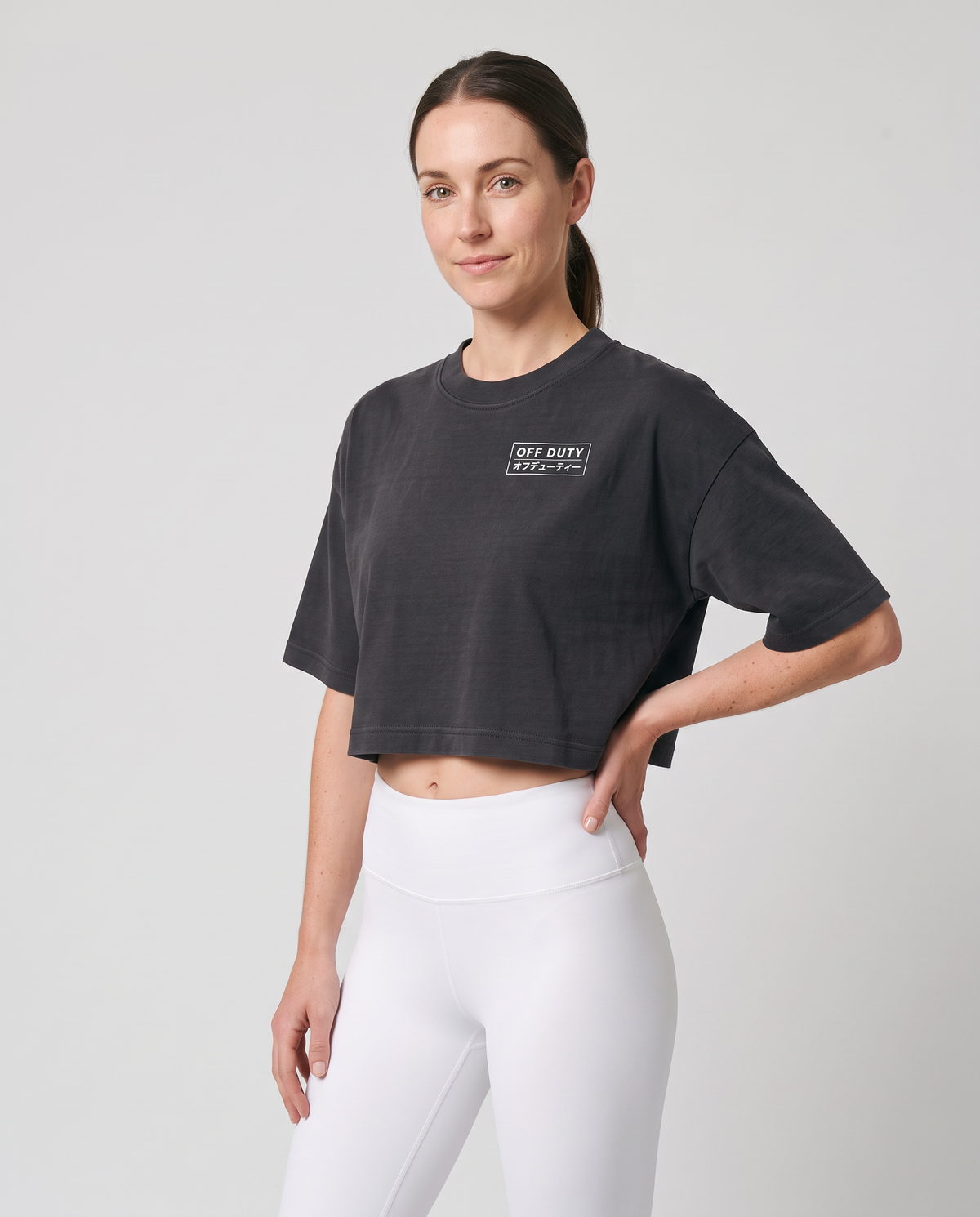 Off Duty The Weekend Cropped Tee in Washed Black on model, scene 5 — od-color:washed-black