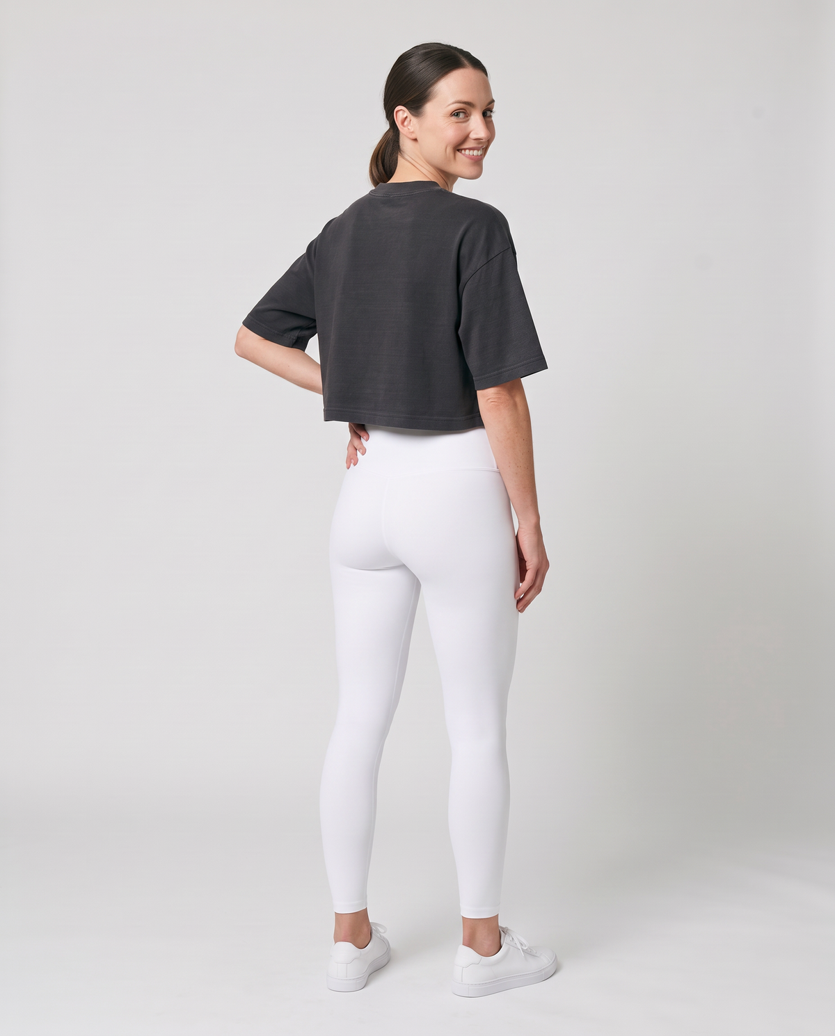Off Duty The Weekend Cropped Tee in Washed Black on model, scene 6 — od-color:washed-black